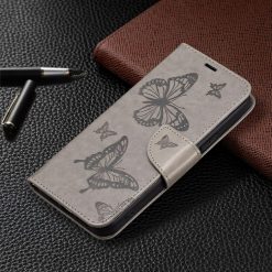 Peňaženkové puzdro Embossing Pattern Motýľ sivé – Samsung Galaxy A54 5G | Kryty na mobil Kryty na mobil | Peňaženkové puzdro Embossing Pattern Motýľ sivé – Samsung Galaxy A54 5G | Kryty na mobil